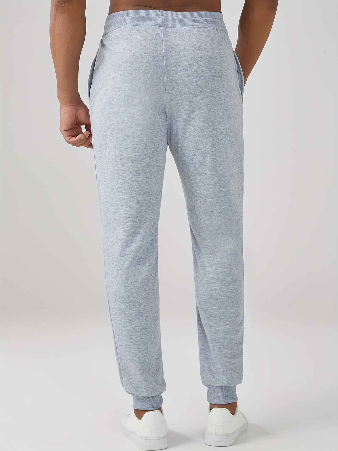 Four-piece set of new Men's casual sports pants, perfect for spring and summer. Made with 100% polyester quick-dry fabric that prevents Light Beige irritation after intense sweating and is durable. Features a slight stretch technology for unrestricted movement during jumping and turning, allowing full freedom in any activity. Ideal for gym workouts, outdoor hiking, daily commuting, rock climbing, city cycling, and fitness training