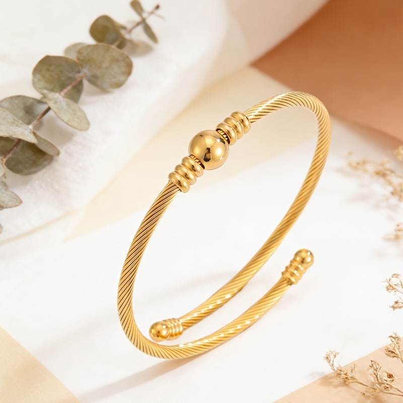 Image of A Vintage Minimalist Stainless Steel Open Bangle With Stainless Steel Beads, Perfect As A Gift For A Husband Or Wife