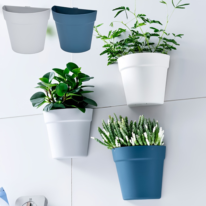 

1pc/2pcs de pots de fleurs murales pour une utilisation , pas besoin de percer, peut également de panier de rangement, un pot de plante .