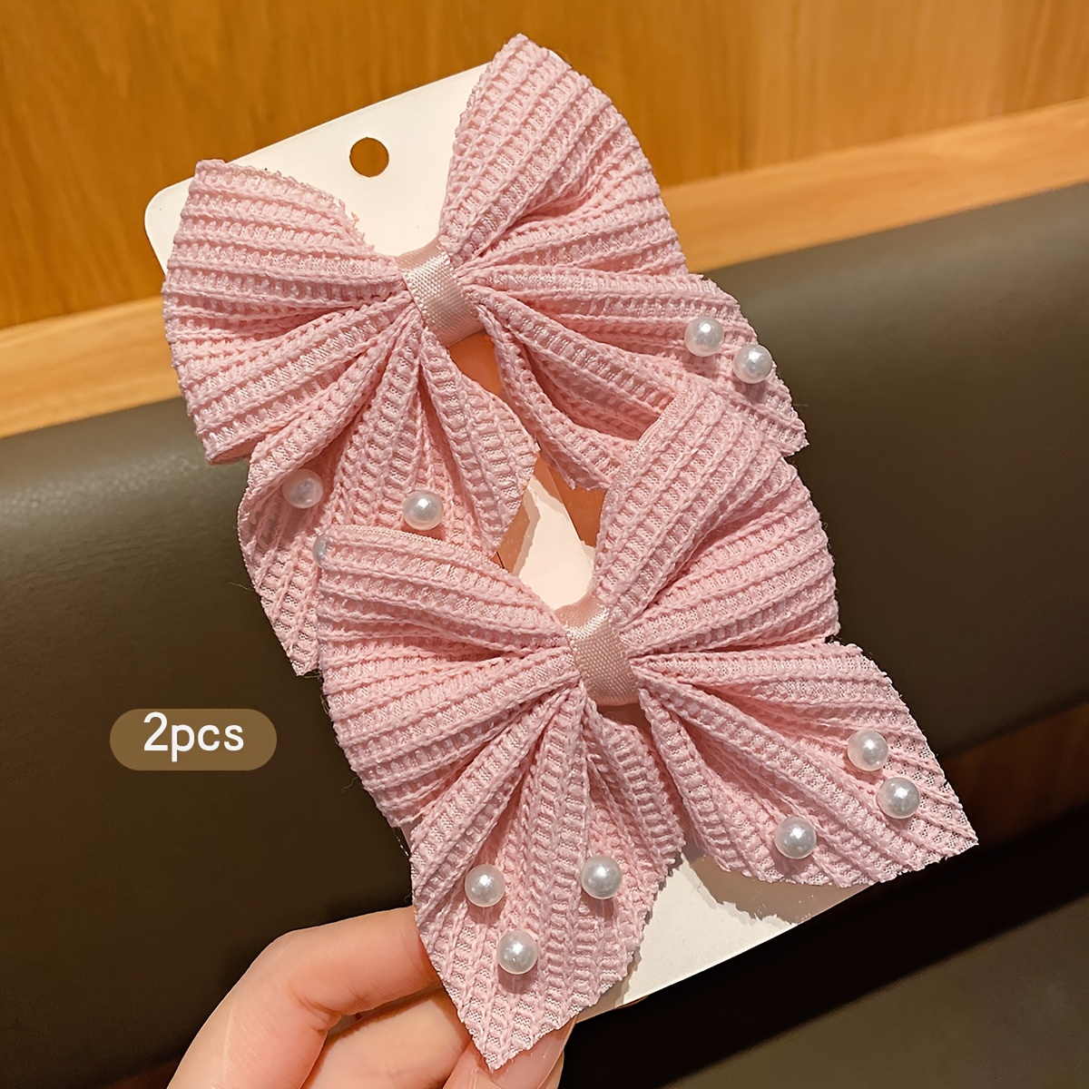 two pink bow hair clips suitable for everyday hair additions