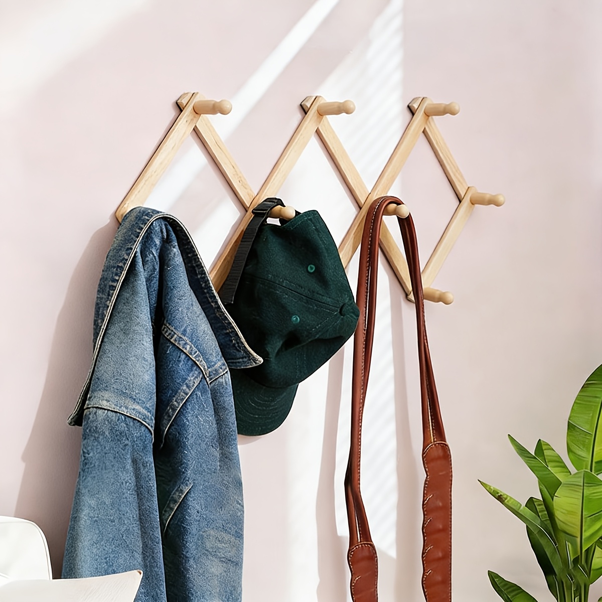 wooden expandable coat rack sold on Temu United States