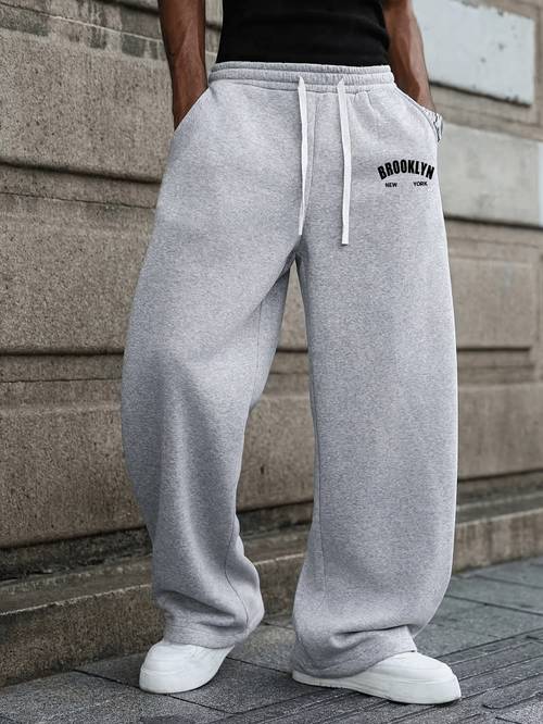 Retro Letter Print Men'S Wide Leg Sweatpants, Elastic Drawstring Waist Street Style Loose Athletic Long Trousers, Side Pocket Detail