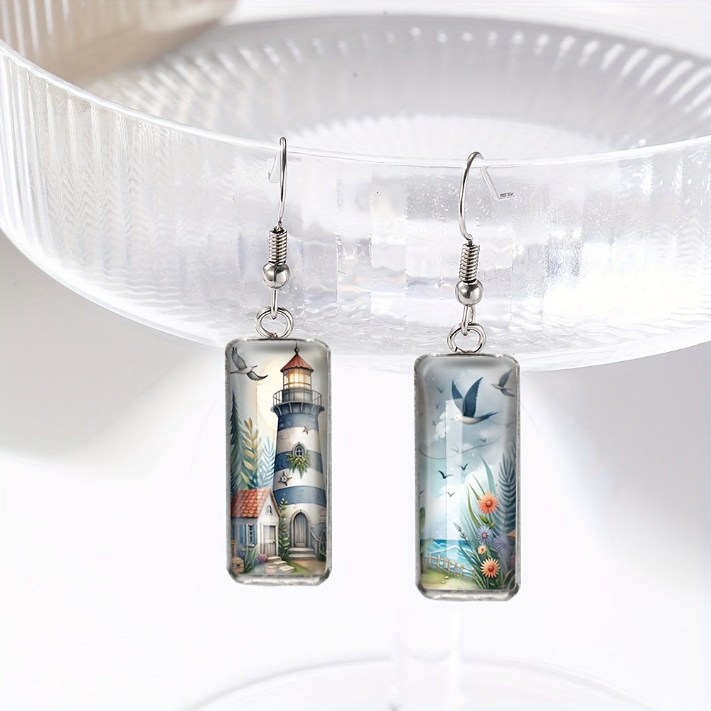 E-shop Ein Paar unregelmäßige Ohrringe mit Küstenvögeln und einem , aus Glas, als Geschenk für einen Freund