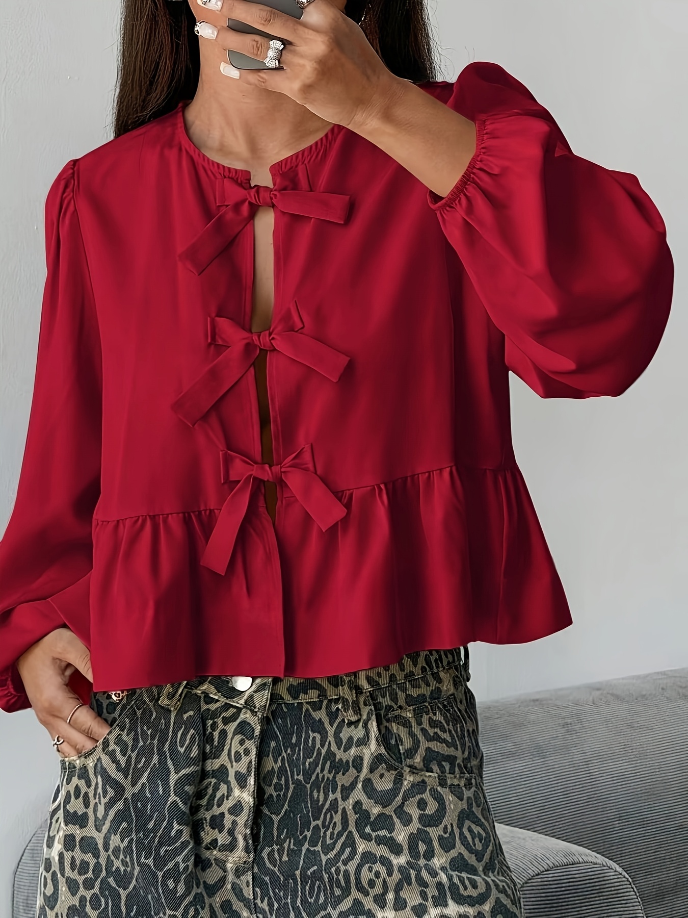 red blouse women sold on Temu Canada