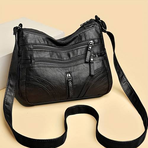 fashionable and elegant shoulder bag with multiple pockets zip closure made of soft synthetic faux leather multi layer handbag for for daily commuting