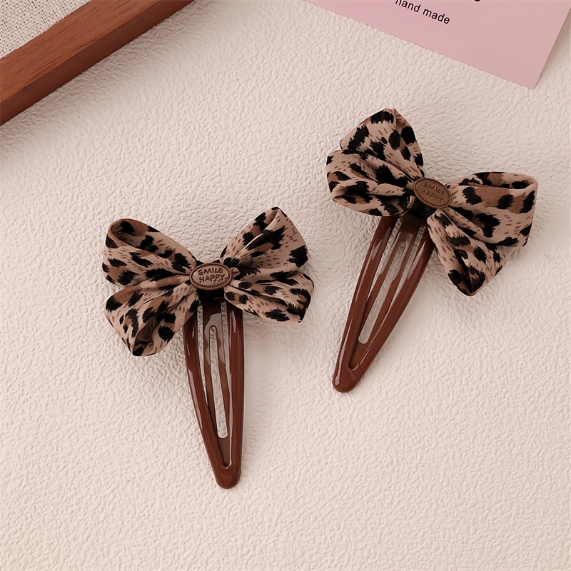 TEMU Lot de 2 pinces à cheveux BB vintage avec nœud à imprimé léopard, pinces à cheveux de avec nœud à imprimé léopard , accessoires pour cheveux