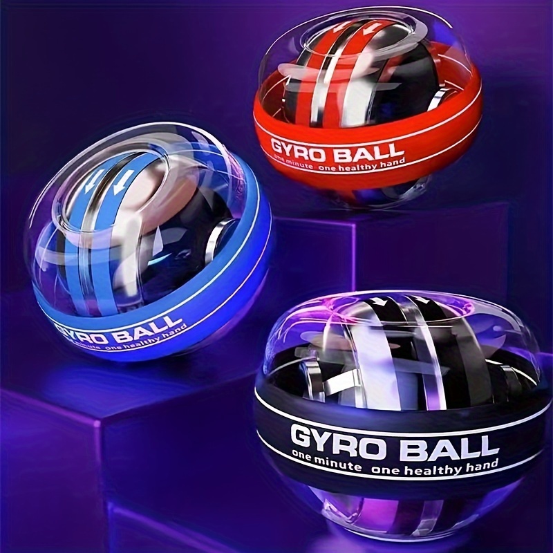 Wrist Strength Training Balls, Grip Balls, And Fitness Gyroscope Balls Are Used by Young People to Relieve Stress And for Muscle Workouts, Focusing on Hand Strength Training
