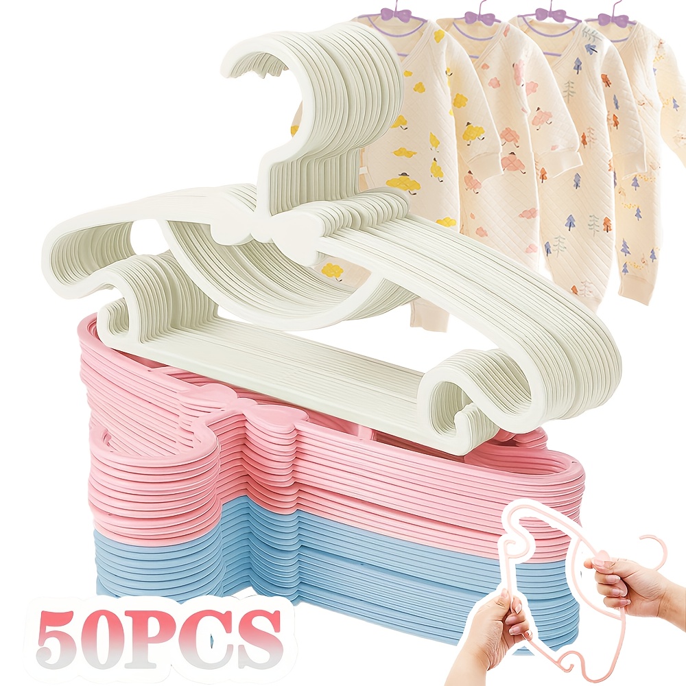 50pcs lightweight plastic hangers for   clothes non slip design suitable for   shirts pants skirts jackets   saving structure ideal for bedroom laundry room nursery closet organization everyday   wardrobe storage 0