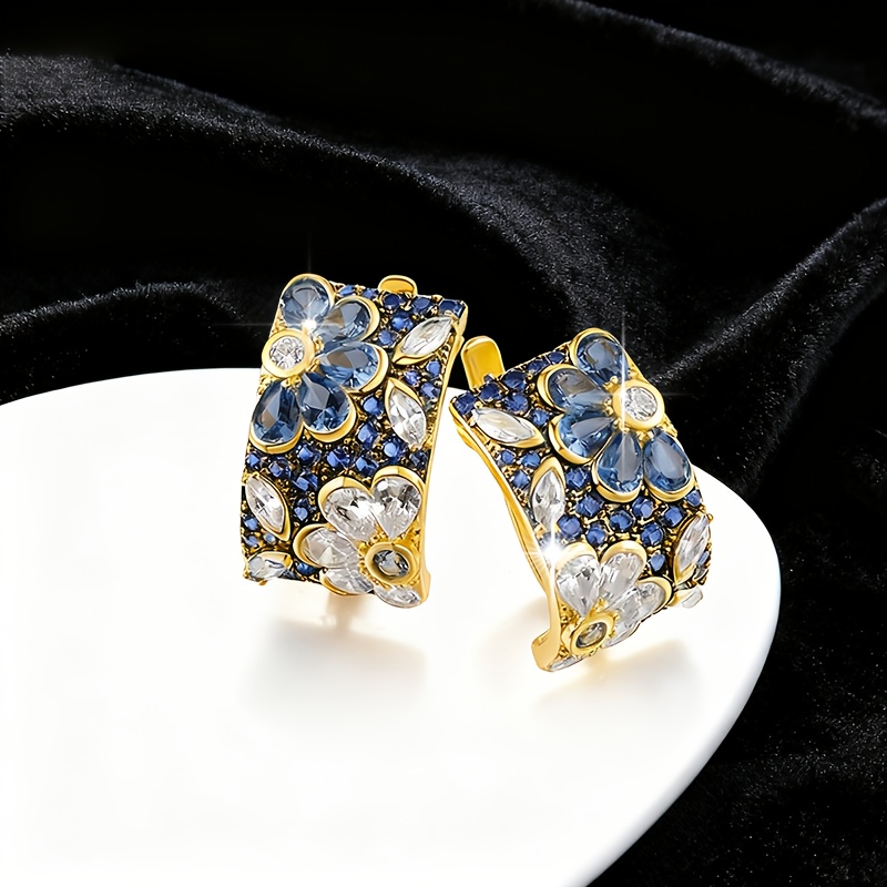 E-shop 2 Stück elegante und luxuriöse florale Ringohrringe, verziert mit kreativen blauen und weißen synthetischen Zirkonia-Akzenten, geeignet für