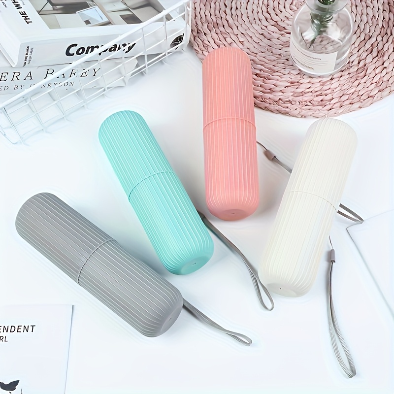 Travel toothbrush with portable storage case, rinsing cup, and toothpaste holder - a compact design, the perfect gift for oral care on the go