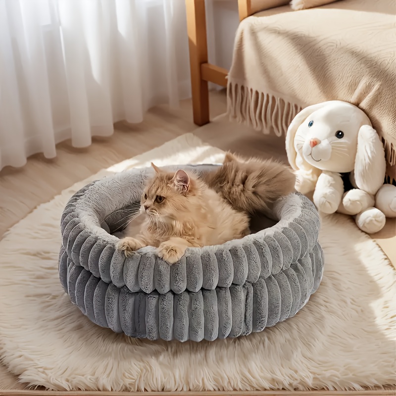 cozy plush round cat nest dog nest high quality pet bed with cushioned     retaining white   fur machine washable for     small to medium pets pet nesting furniture   retaining nest soft plush nest   Product details 0