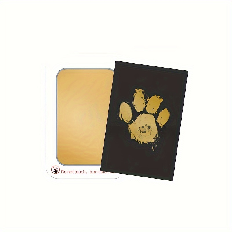 

The Moments Of You And Pet A Golden Paw Ink Pad. Choose From Multiple And Receive 2 Black Cards As A Gift.