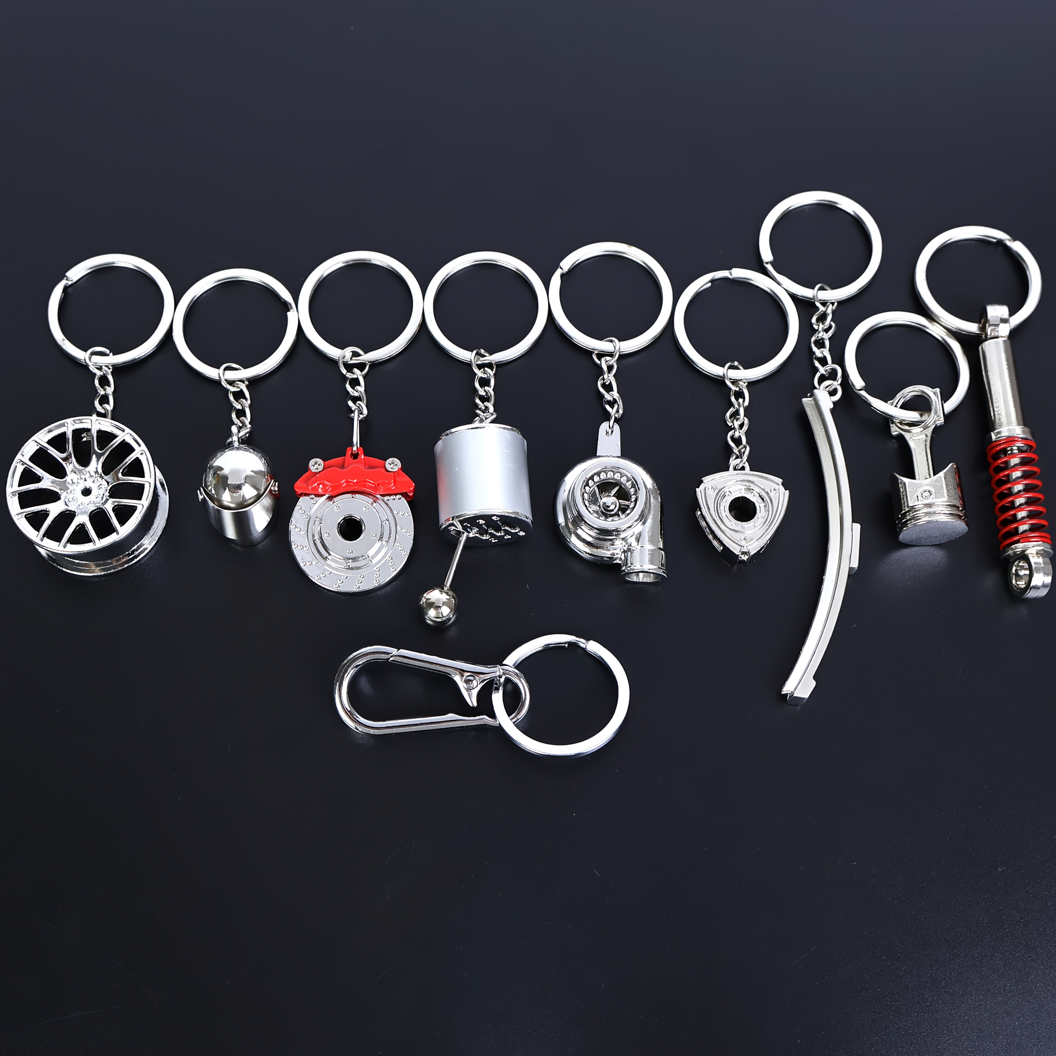 E-shop 10 Stück Auto Tuning Schlüsselanhänger inklusive Gangschaltknöpfe, Turbo, Felgen, S, Bremsbeläge, Rotorblätter, Scheibenwischer, Kolben,