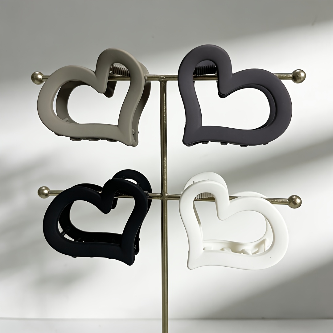 Image of 4pcs Matte Hollow Heart Hair Clip Set Korean Minimalist Gentle Sweet Elements Hair Clips For Medium-length Hair