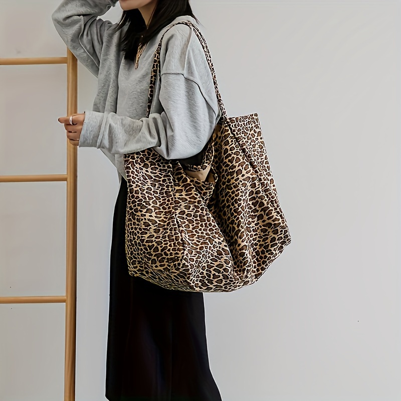 

Casual Leopard Print Canvas Tote Bag For Women, Large Capacity Shoulder Bag With Fixed Straps, No-closure Unlined Shopper For Daily Commute, Shopping, Vacation, And Class
