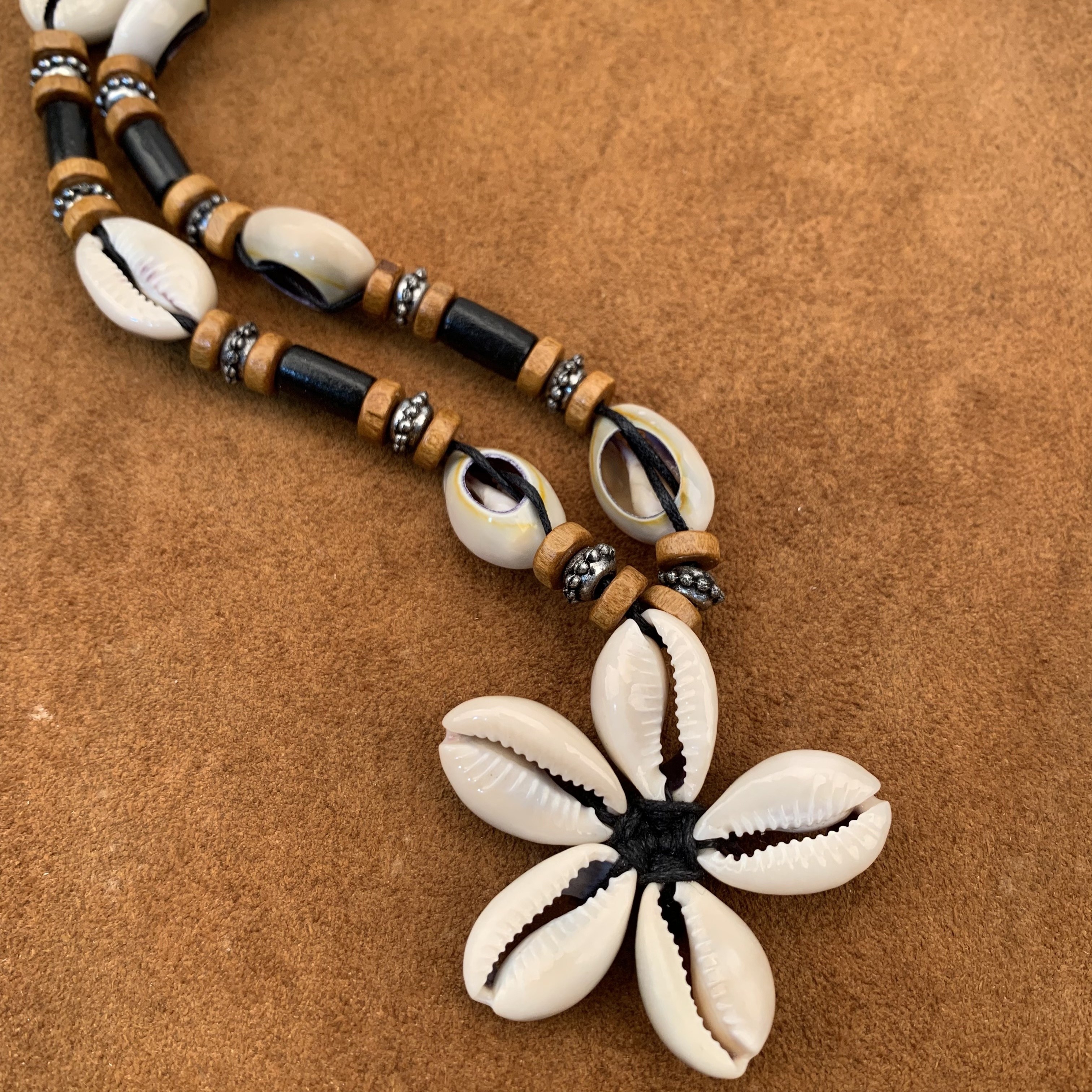 

Cowrie Shells Flower Pendant On Braided Hemp Cord Choker Necklace With Puka Shell Beads