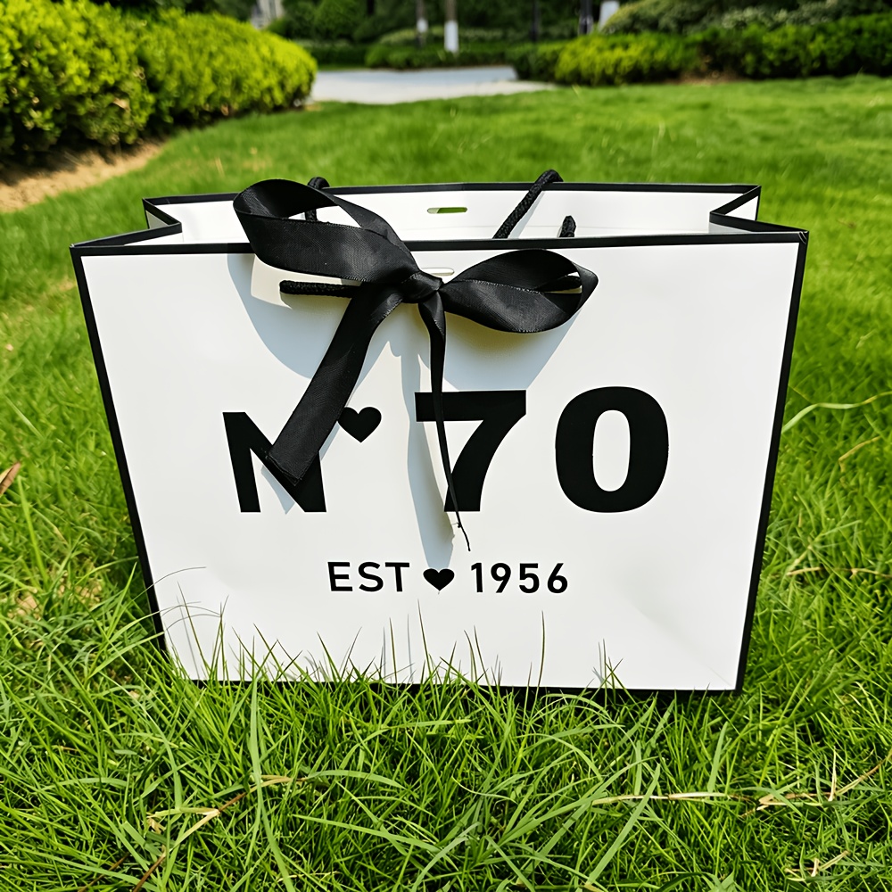 TEMU Gift For Her/him 70th Birthday Gift Bag, Equipped With A Black Ribbon Bow, A Paper Gift Bag With A Convenient Handle, Suitable For 70th Birthday