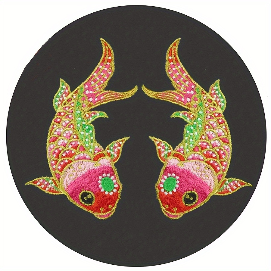 A Pair Of Magenta Embroidered Patches Of Fish For Clothing Decoration