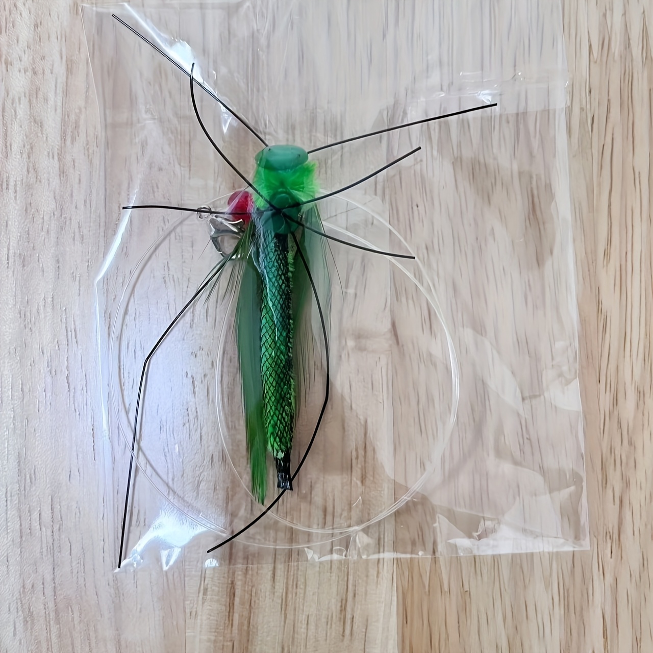   feline   featuring a lifelike insect design complete with a lengthy and synthetic feathers made from durable plastic   battery       and exercise for indoor kittens Product details 7
