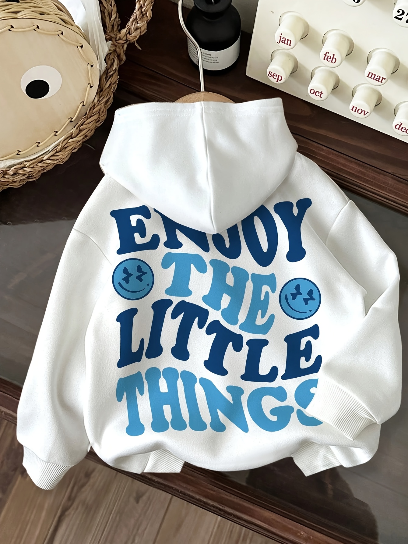 smile hoodie sold on Temu United States