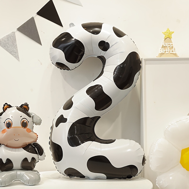 Balloon Shaped Like 2 With A Cow Print, Featuring A 3d Design. Large 40-inch Foil Mylar Balloons Are Perfect For Birthday Celebrations, For A Cowboy Or Cowgirl Themed Party