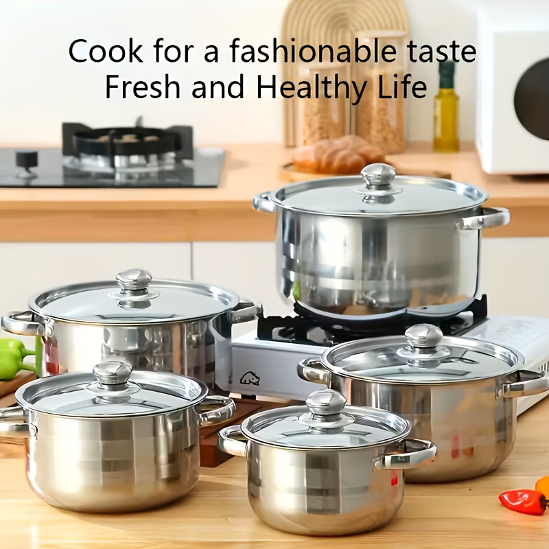 item picture   stainless steel cookware set with 5 pots and 5 lids compatible with a   of cookers for cooking a   of dishes with glass lids and golden anti   handles suitable for home and restaurant use easy to clean