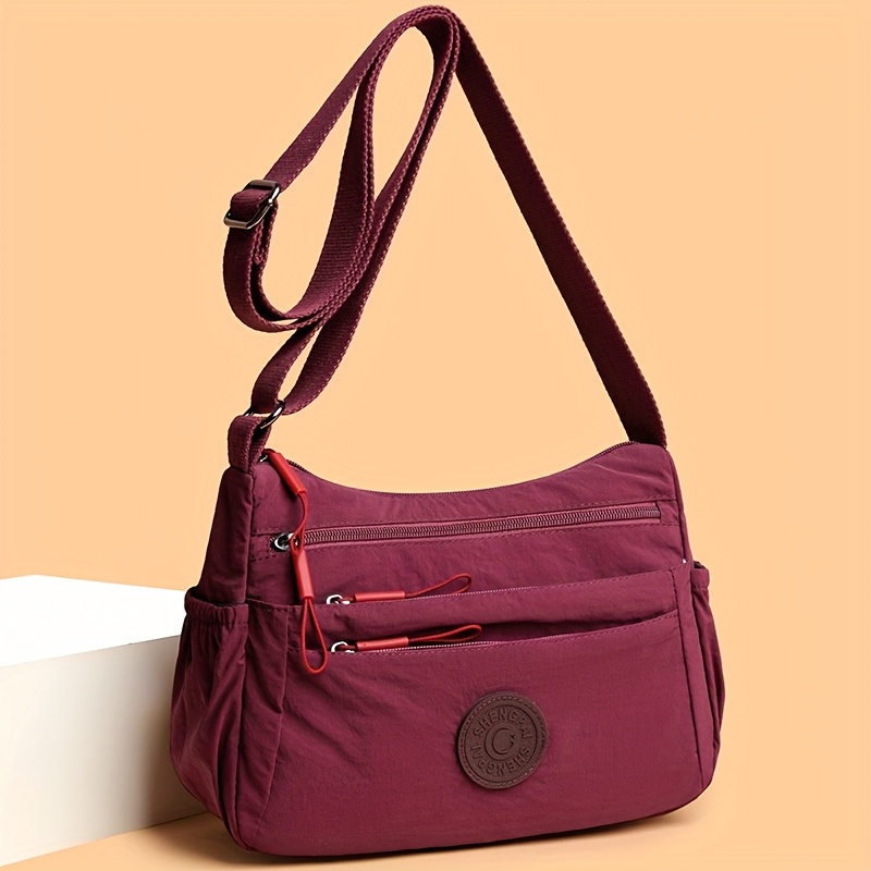 

1pc Burgundy Casual Crossbody Bag For Women, Solid Color Fabric With Zipper Closure, Multi-pocket And Compartments, Polyester Lined, For Commuting, Travel, Shopping, Gift