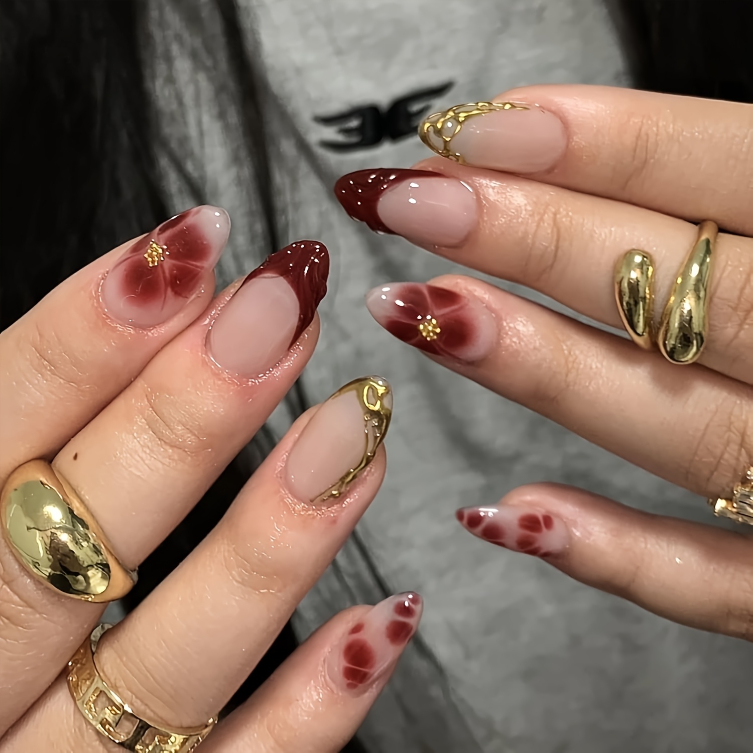 24pcs press on nails set medium to long almond shape with soft nude pink base elegant floral patterns and   accents glossy end nail   for women daily wear party and fashion looks