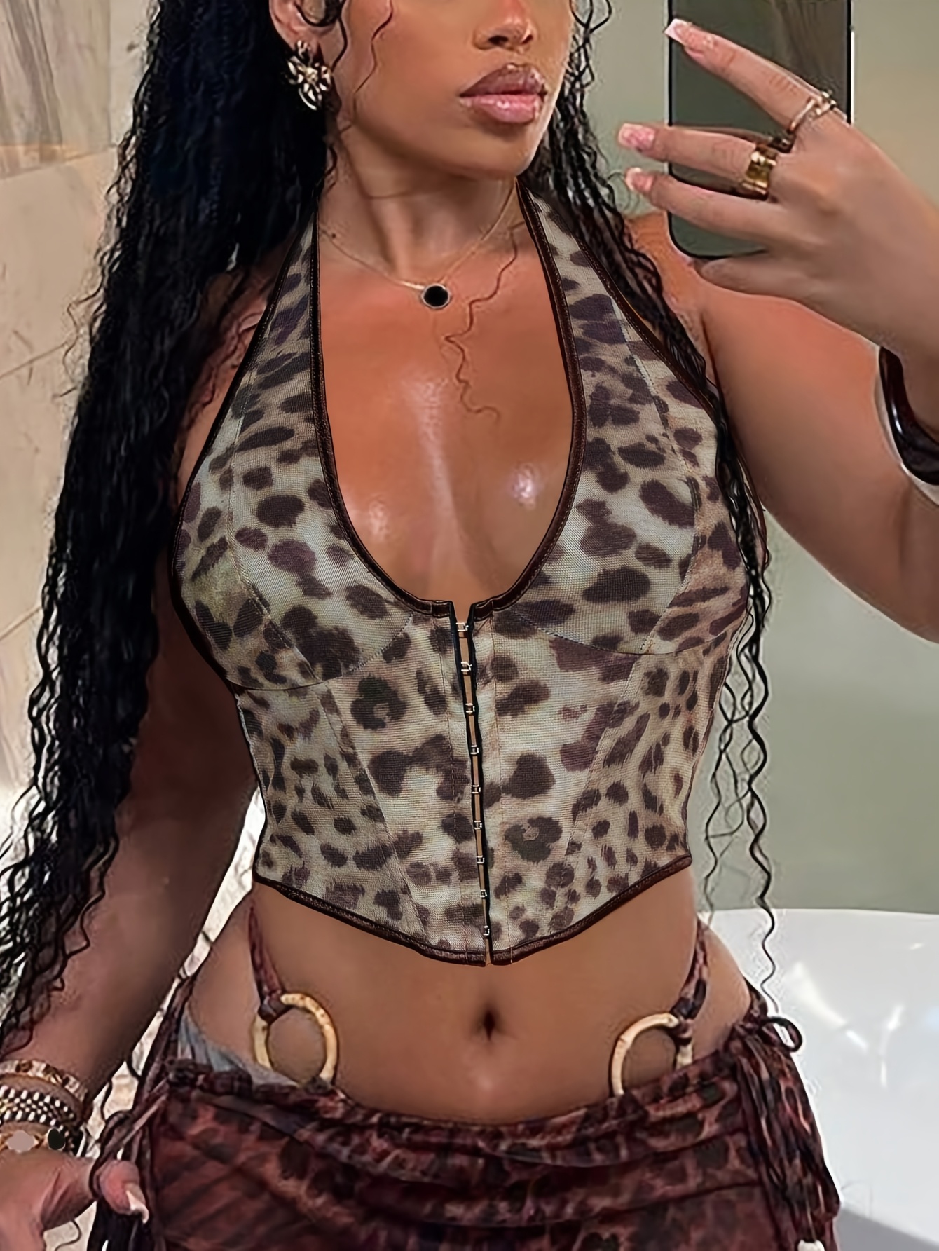 This Is a Women'S Leopard Print Halter Neck Top, a Stylish And Elegant Sleeveless Fitted Shirt for Summer.