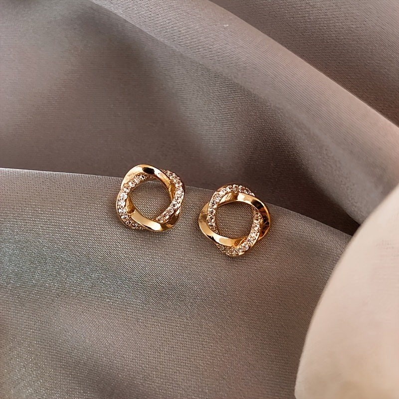 Alloy Circle Stud Earrings with Rhinestone Detailing and Stainless Steel Post