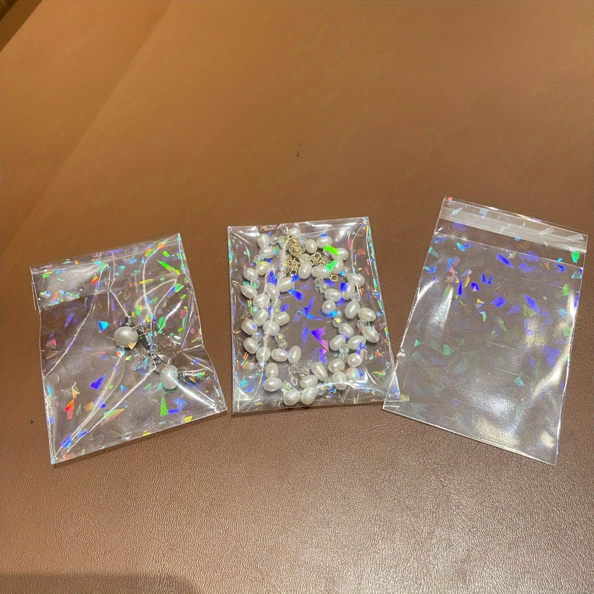 50 Transparent Laser Jewelry Pouches, Glitter Storage Bags