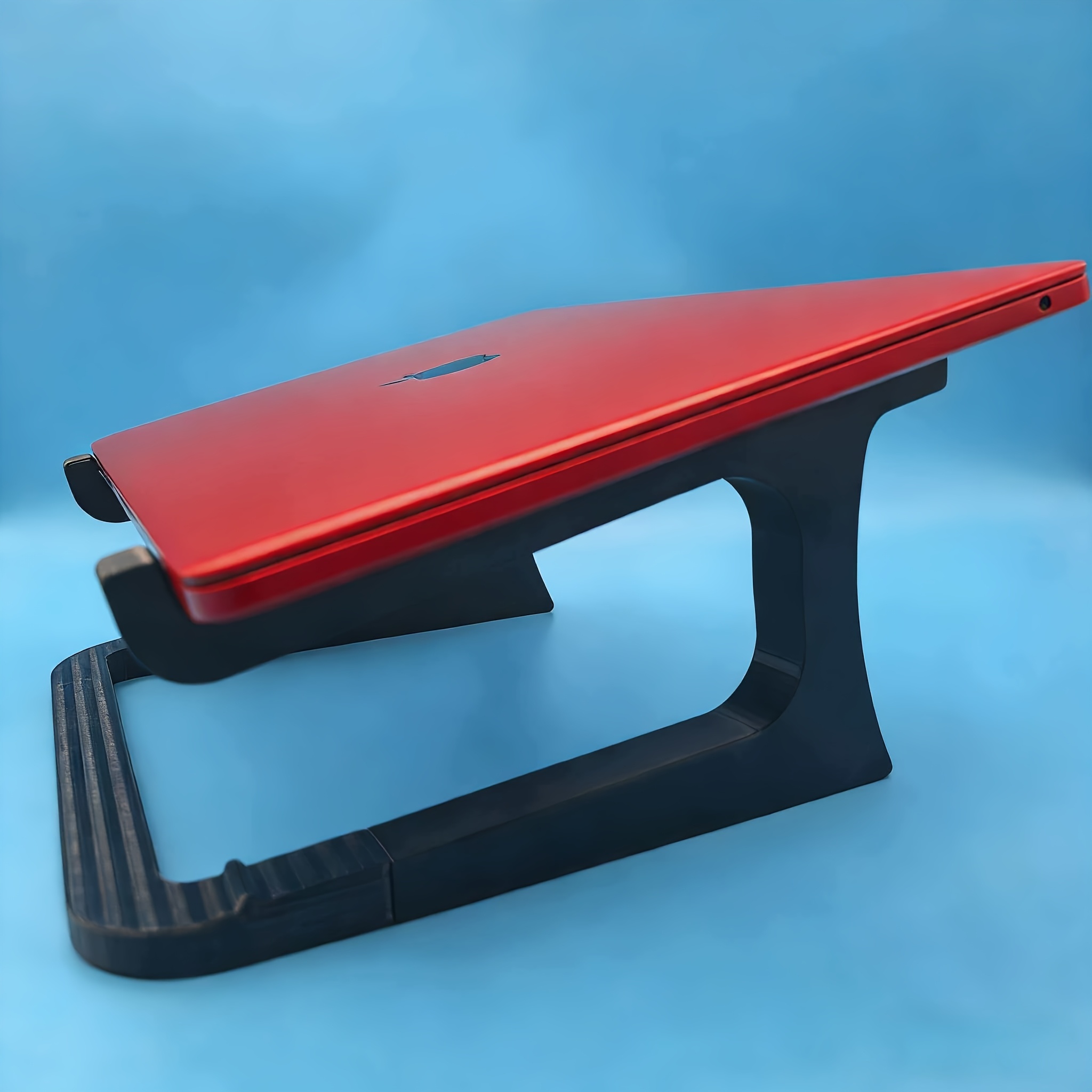 E-shop Ein 3D-gedruckter Laptopständer mit Nackenstütze Höhenverstellung, ausgestattet mit einem leistungsstarken Kühldesign, um ständiges