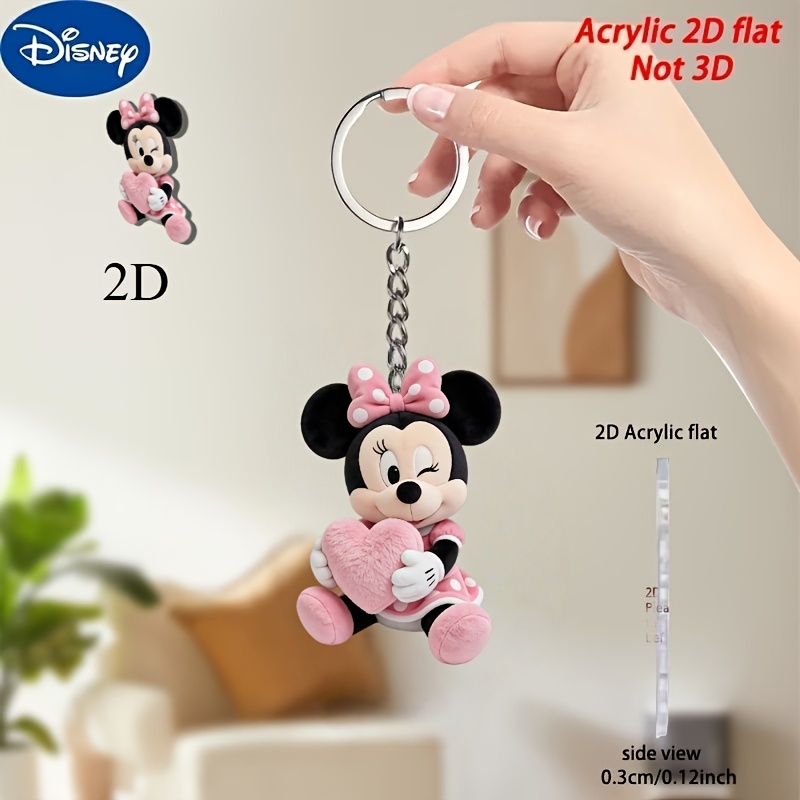 E-shop 2D-flach, Produkt: Ein niedlicher 2D-flacher Minnie-Maus-Schlüsselanhänger in Herzform aus Acryl von mit einem bezaubernden Design. Ideal für