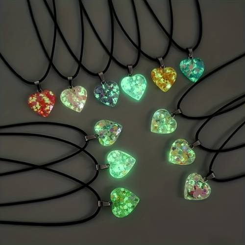 10pcs set of glow in the dark resin heart shaped pendant necklaces featuring fluorescent heart shaped pendants with black cords ideal as christmas or valentines day gifts suitable for diy necklace jewelry making 5 pendants and 5