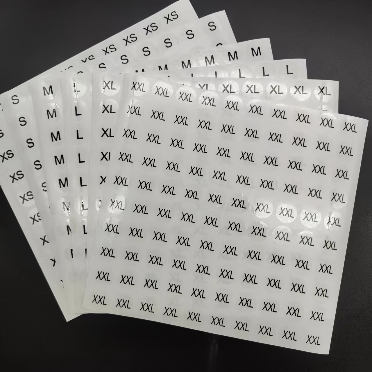 

500-piece 0.59" Round Waterproof Clothing - Transparent With Black Lettering, Sizes Xs To Xxl