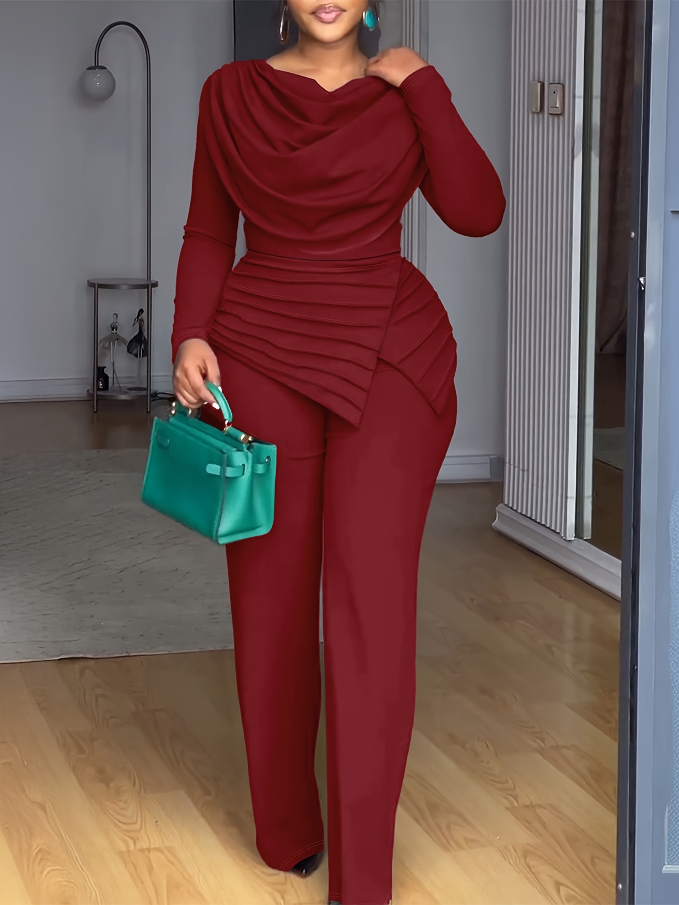 A Long-Sleeved Top with a Gathered Design And a Waist-Cinching Feature, Paired with Wide-Leg Jumpsuits