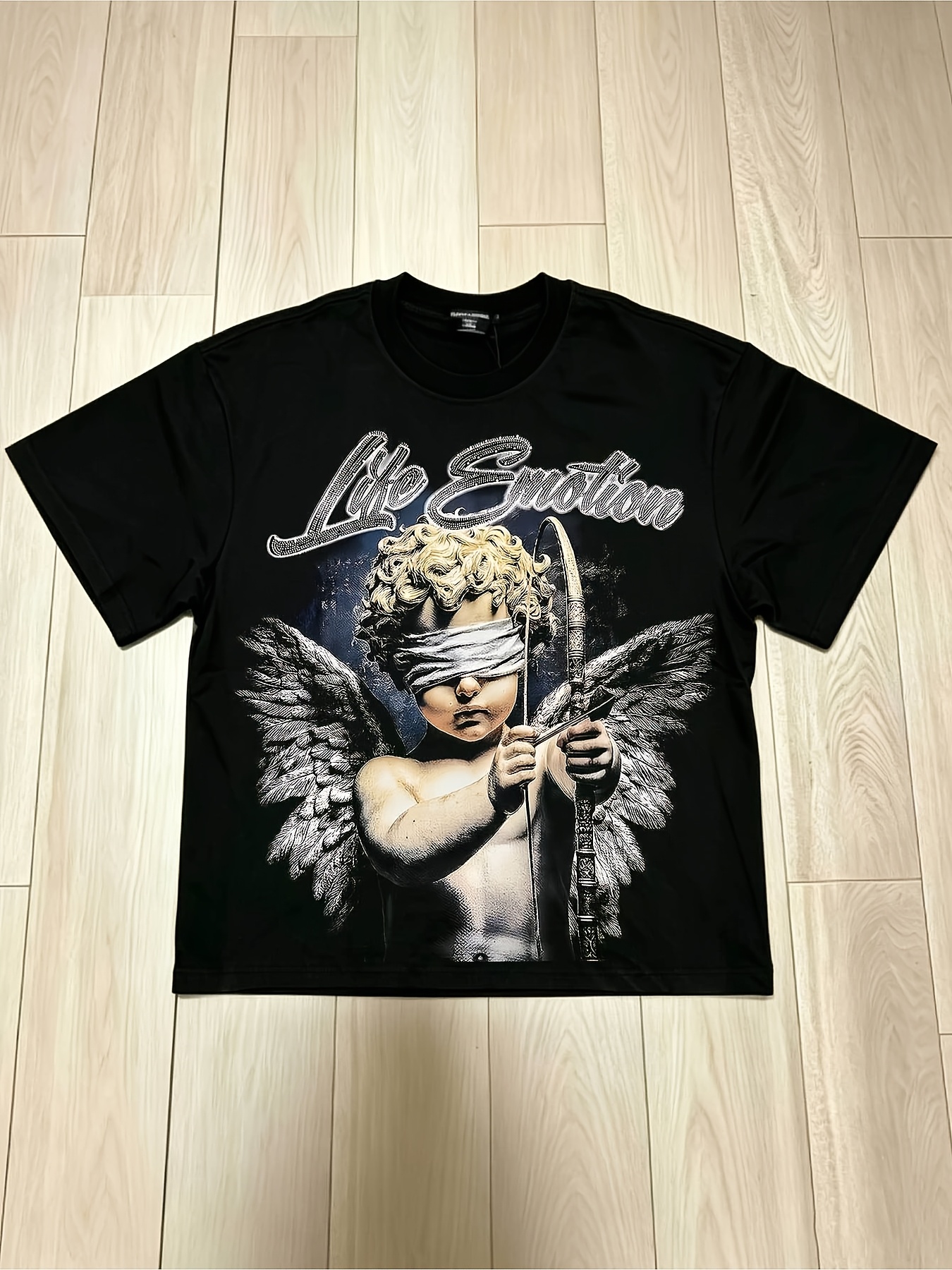 rhinestones shirt sold on Temu United States
