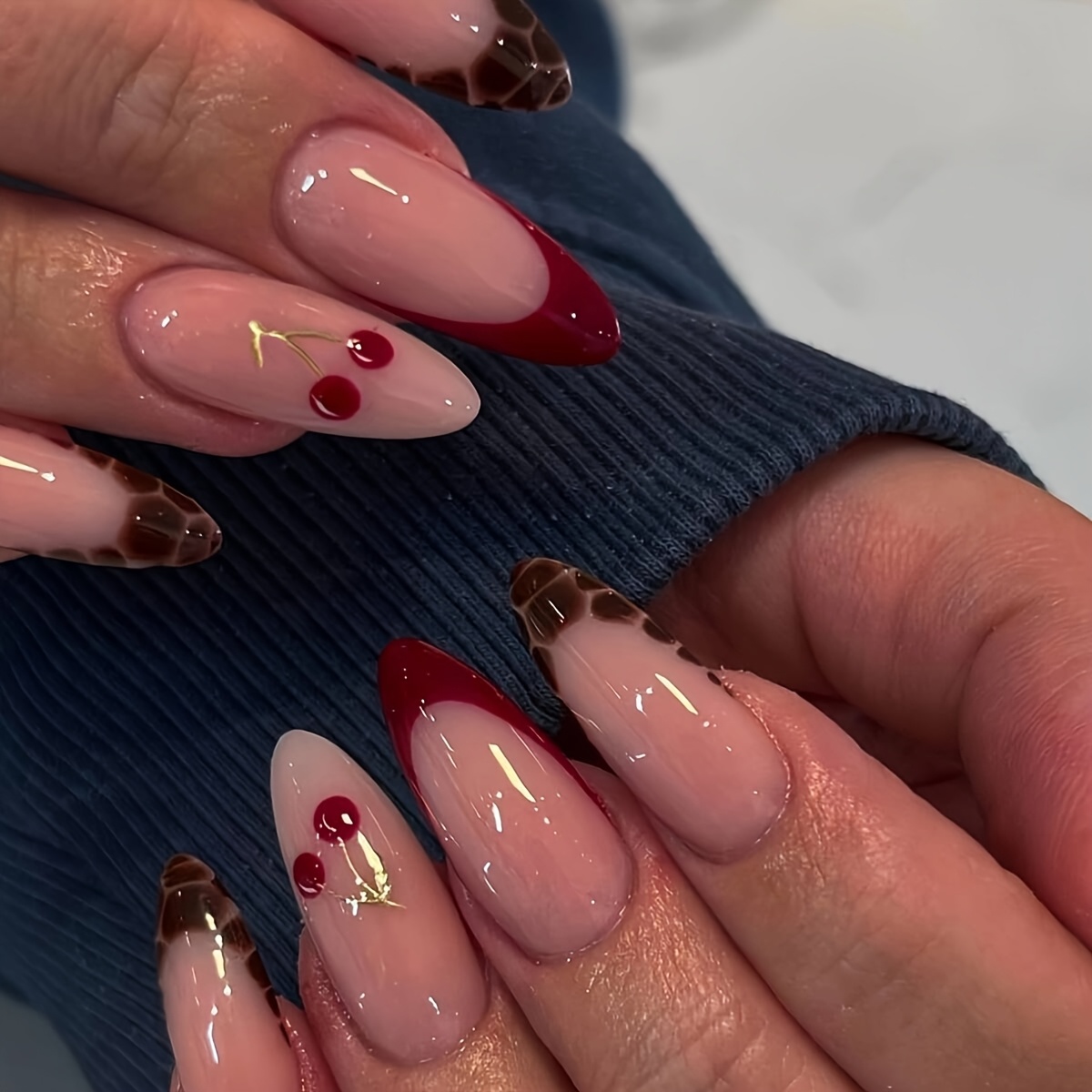 A Set Of 24 Medium-long Almond-shaped False Nails With Elegant Lines And Sweet Cherries, Suitable For And. The Box Includes A Nail File And Jelly Glue For Easy Application