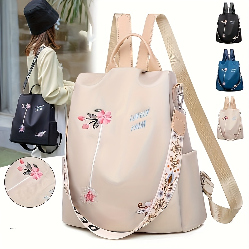 

1pc Floral Embroidered Polyester Backpack - Waterproof Nylon Shoulder Bag With Anti-theft Features, Large Capacity For Women, Suitable For And School Use - In Black, Blue, Khaki