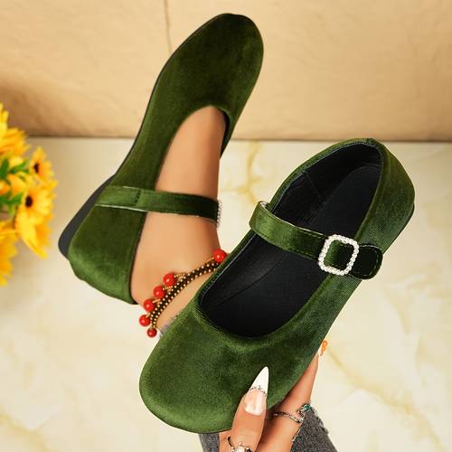a pair of womens casual flat shoes featuring a round toe design with shiny rhinestones on the straps made from lightweight solid color velvet fabric comfortable wear in women shoes