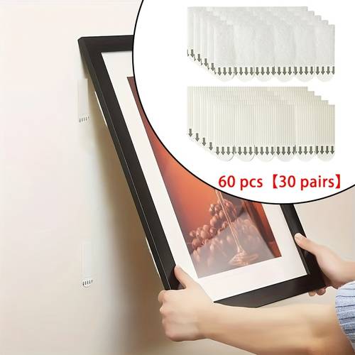heavy duty picture hanging strips leave suitable for securing frames and posters on smooth like glass and wood making them an for decorating the walls of living rooms bedrooms or offices