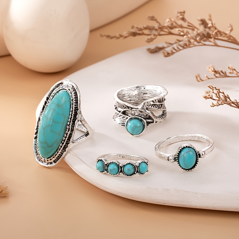 TEMU Parure de 4 bagues turquoise bohème vintage : bague tendance à vieillie, bague plume, bague à empiler multicolores pour . Bagues turquoise pour