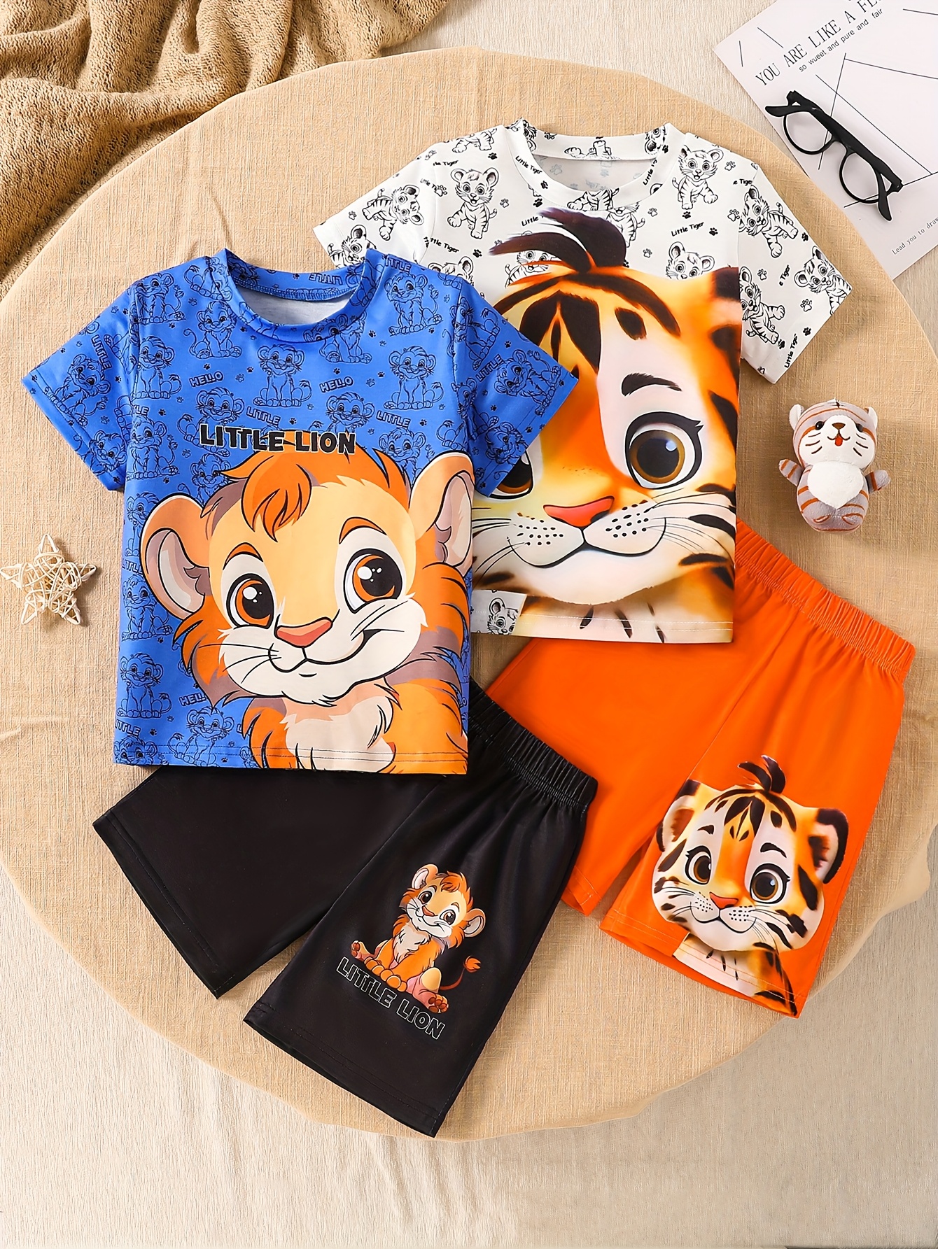 a set of 4 cute   print short sleeve outfits for boys featuring a round neck t shirt and comfortable shorts   summer wear school outfits or as a gift for outdoor