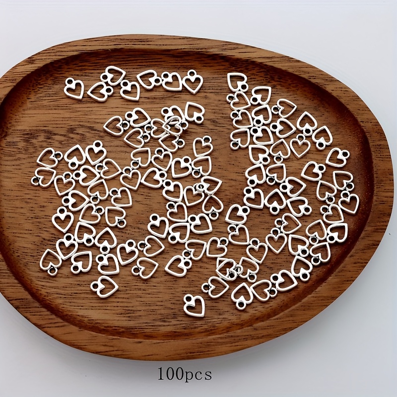 50pcs/100pcs Hollow Ancient Silvery Heart Love Pendant Charms Alloy Heart Pendant Love Pendants Charms For Making Ideal For Bracelets And Necklaces Earrings Crafting Accessories