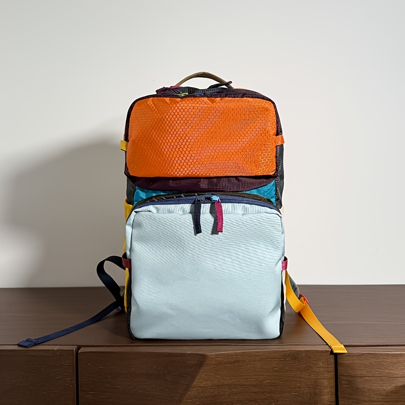 Image of Dopamine-colored Women's Backpack With Multiple Pockets, Large Capacity, And Lightweight Design. Suitable For Travel, Hiking, Mountaineering, And Commuting, In Mixed Color Schemes