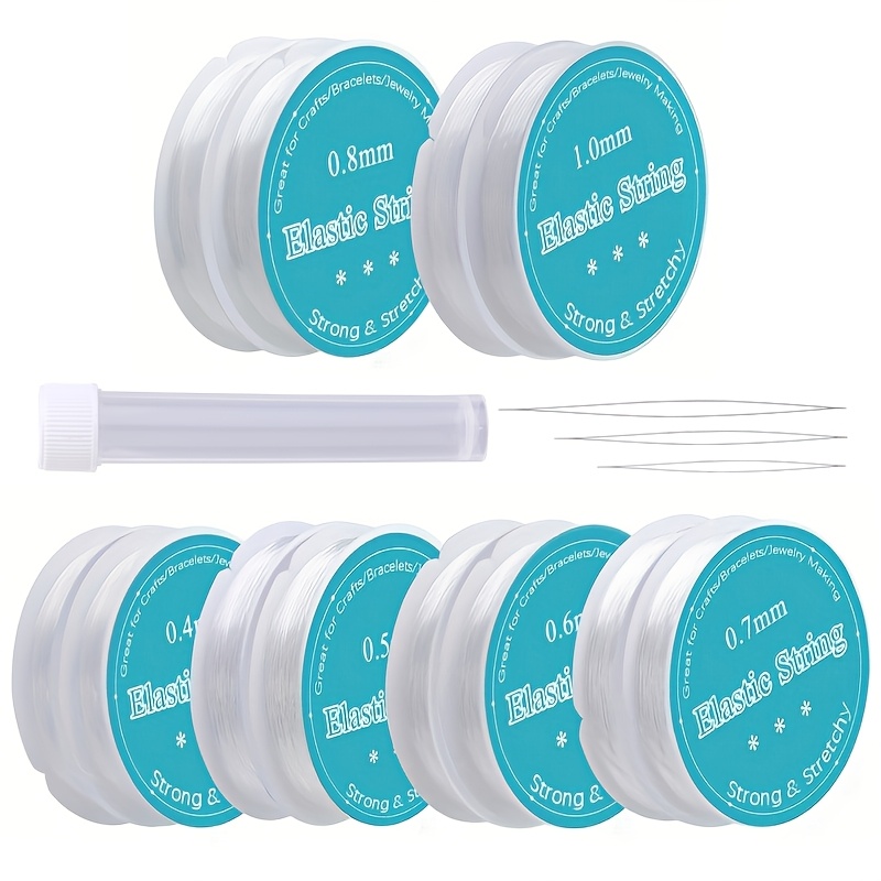 Image of 12 Rolls Of Elastic Thread, With Specifications Of 0.4 Mm, 0.5 Mm, 0.6 Mm, 0.7 Mm, 0.8 Mm, And 1 Mm. Are 3 Different Sizes Of Threaded Needles, Used For Handcrafted Bracelets And Colored Additions