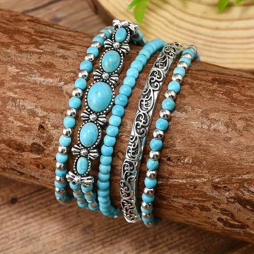 Een set van 5 bohemian vintage stijl legering imitatie turkoois kralen armbanden, geschikt voor dagelijks gebruik door vrouwen, perfect als Valentijnscadeau voor een vriendin.