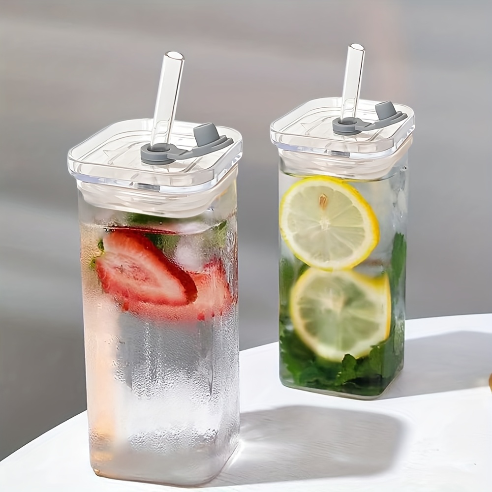 glass bottle with straw sold on Temu United States