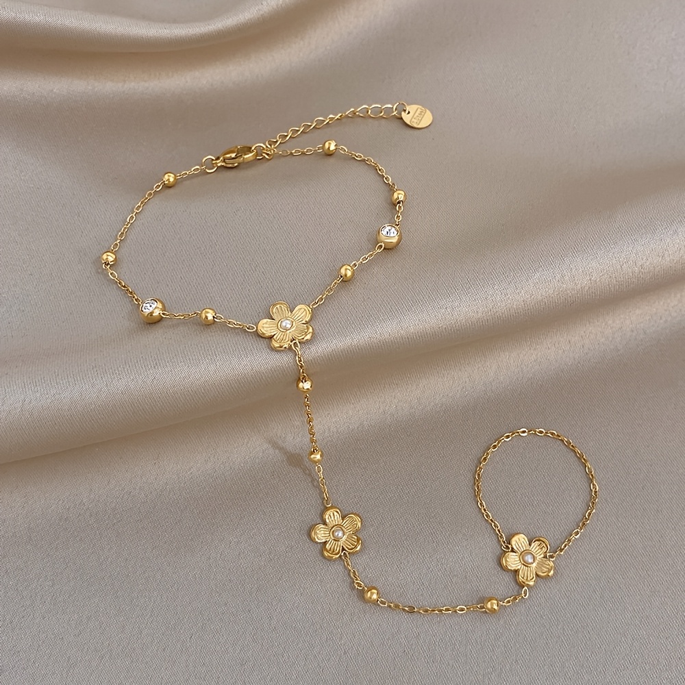 Women's Plum Blossom Finger Chain Bracelet with Synthetic Zirconia