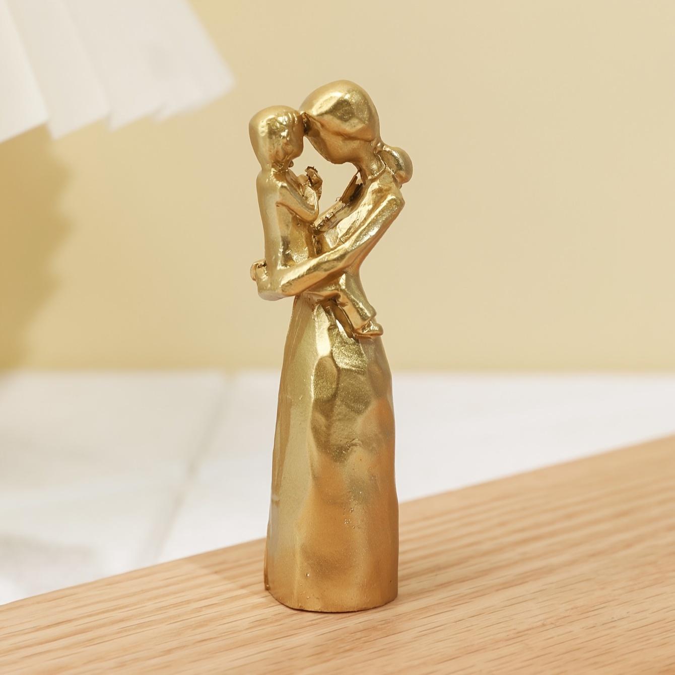 a decorative figurine of a mother and Product details 6